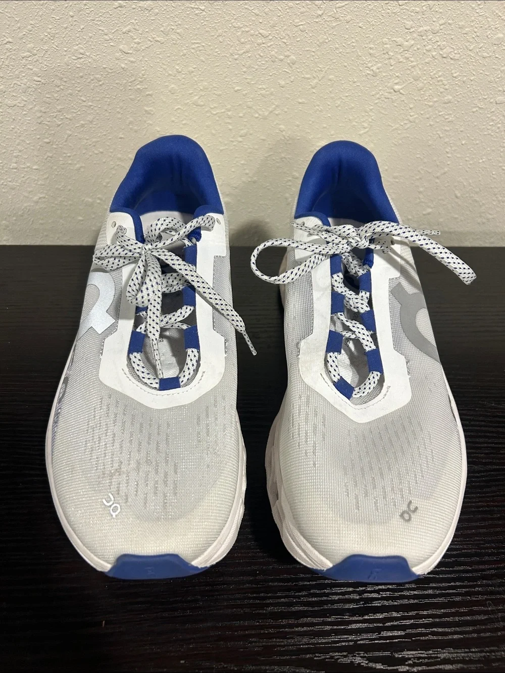 On Running White and Blue Cloudmonster Sneakers